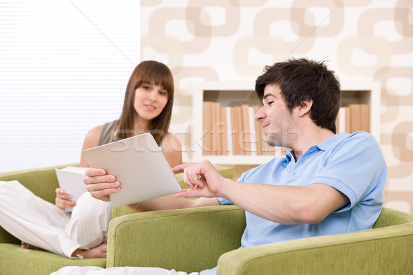 Stock photo: Student - young man with touch screen tablet computer