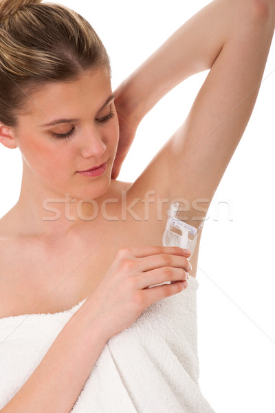 Body care series - beautiful woman shaving her armpit Stock photo © CandyboxPhoto