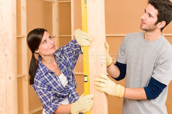 Home improvement glimlachend paar geest niveau Stockfoto © CandyboxPhoto