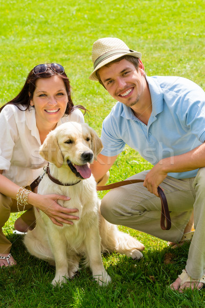 Young happy couple with Labrador dog Stock photo © CandyboxPhoto