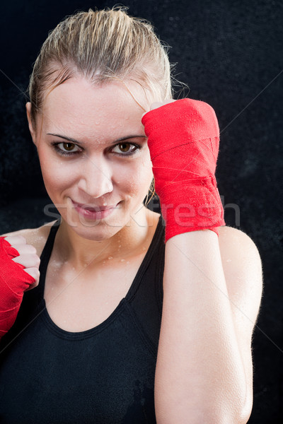 Boxing training blond woman sparring punching bag Stock photo © CandyboxPhoto
