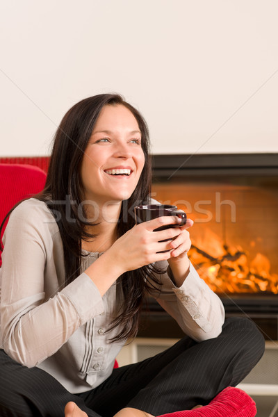 [[stock_photo]]: Hiver · maison · cheminée · femme · boire · chaud