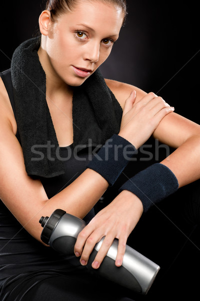 Sporty woman with towel behind her neck Stock photo © CandyboxPhoto