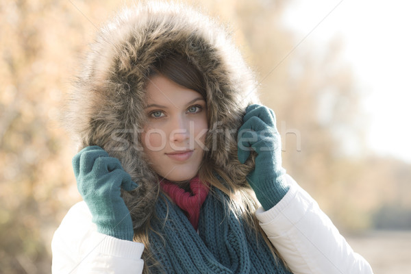 Winter fashion - woman with fur hood outdoors Stock photo © CandyboxPhoto