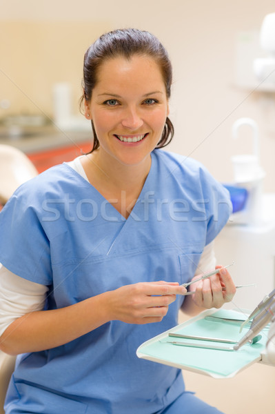 Uśmiechnięty dentysta kobieta stomatologicznych narzędzia kobiet Zdjęcia stock © CandyboxPhoto