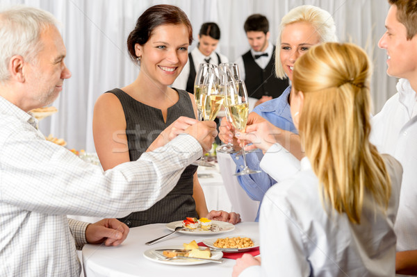 üzleti partnerek pirítós pezsgő cég esemény ünneplés Stock fotó © CandyboxPhoto