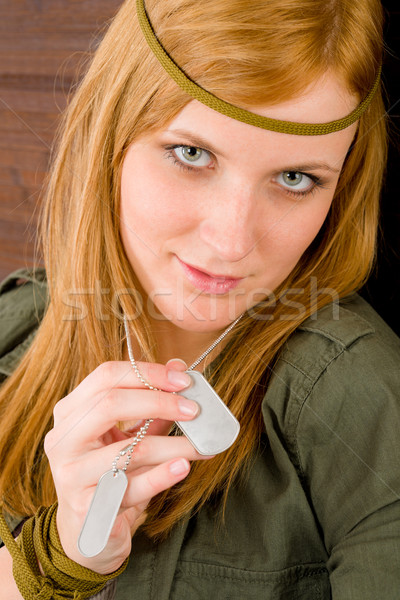 Hippie young woman in khaki outfit hold dog-tag Stock photo © CandyboxPhoto