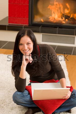 Home fireplace happy woman read book winter Stock photo © CandyboxPhoto