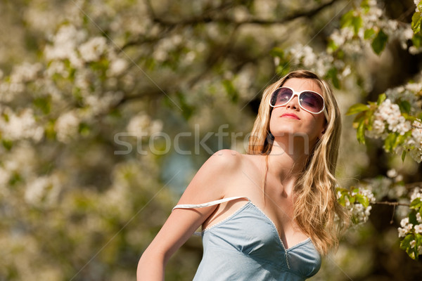 Spring - Young woman under blossom tree in orchard Stock photo © CandyboxPhoto