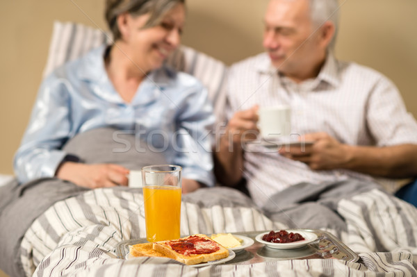 Bere caffè letto mangiare colazione uomo Foto d'archivio © CandyboxPhoto