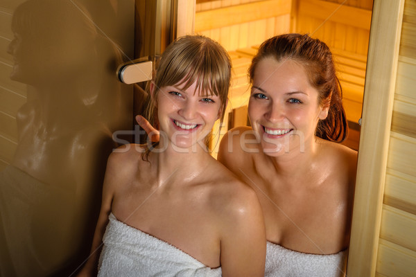 Dos mujeres sauna toalla dos jóvenes sudoroso Foto stock © CandyboxPhoto