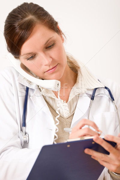 Foto stock: Feminino · médico · telefone · médico · arquivo · estetoscópio