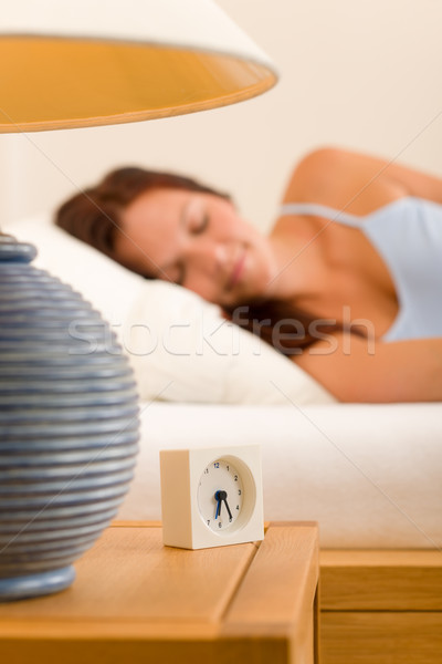 Alarm clock Woman sleeping in white bed Stock photo © CandyboxPhoto