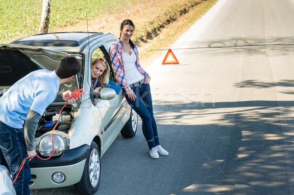 Car defect man helping two female friends Stock photo © CandyboxPhoto