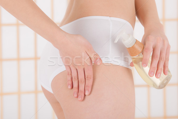 Test törődés fiatal nő jelentkezik masszázsolaj közelkép Stock fotó © CandyboxPhoto