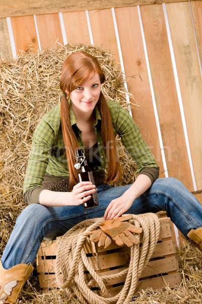 Provocative young cowgirl drink beer in barn Stock photo © CandyboxPhoto