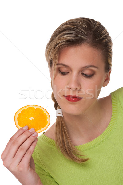 [[stock_photo]]: Femme · tranche · orange · blanche