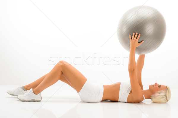Slim blond woman exercises with fitness ball  Stock photo © CandyboxPhoto