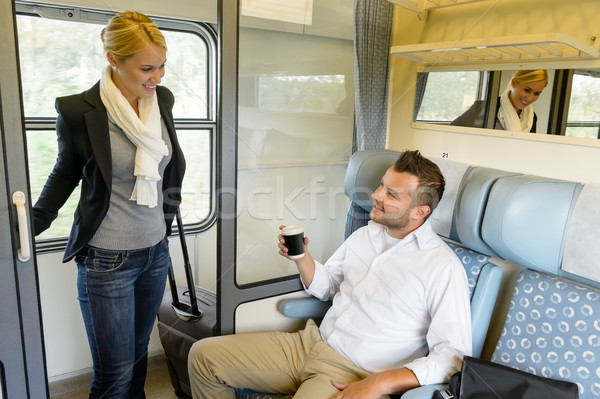 Mujer tren compartimiento hombre sonriendo viaje Foto stock © CandyboxPhoto