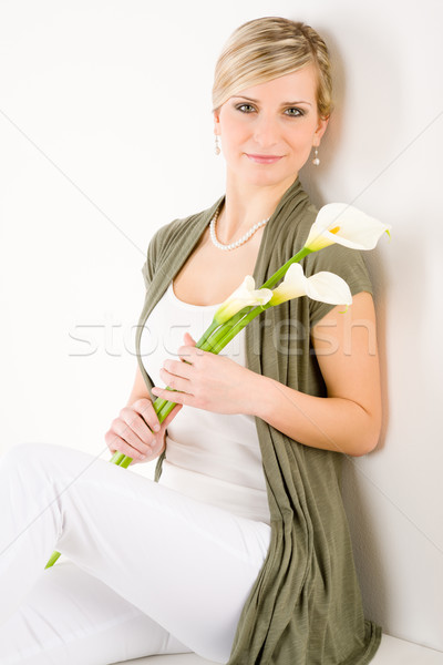 Romantic woman hold calla lily flower sitting Stock photo © CandyboxPhoto