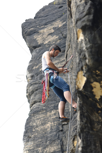 Rock climbing fit man on rope sunny Stock photo © CandyboxPhoto