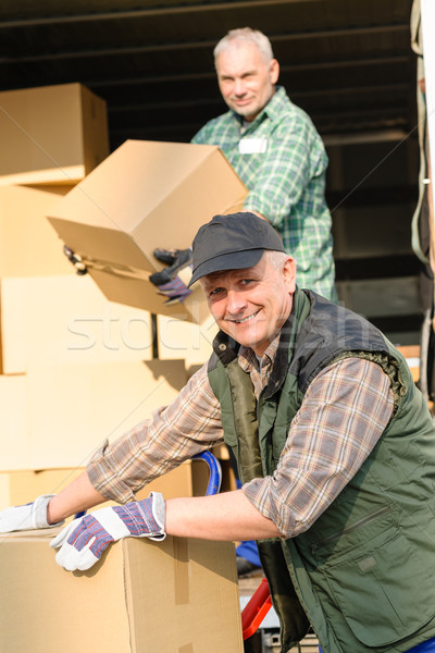 Delivery service mover man cardboard box Stock photo © CandyboxPhoto