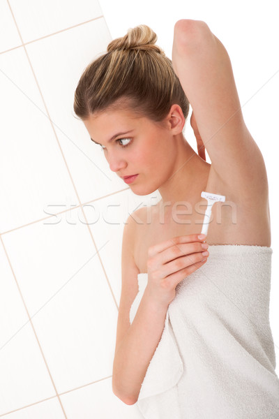 Body care series - Blond woman shaving her armpit Stock photo © CandyboxPhoto