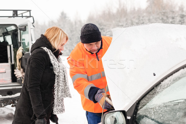 Woman mechanic looking under car hood snow Stock photo © CandyboxPhoto
