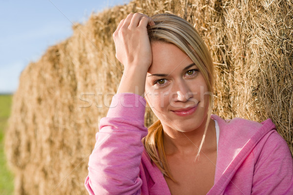 Sportive young woman relax by bales sunset Stock photo © CandyboxPhoto