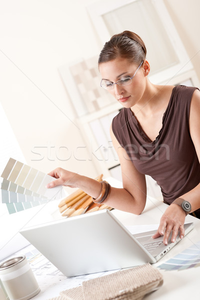 Smiling female designer with color swatch  Stock photo © CandyboxPhoto