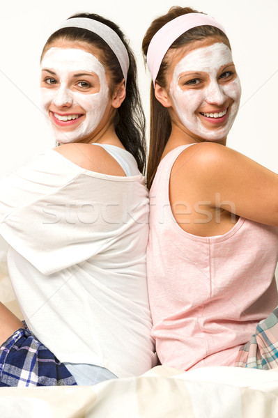 Two female friends with facial mask Stock photo © CandyboxPhoto