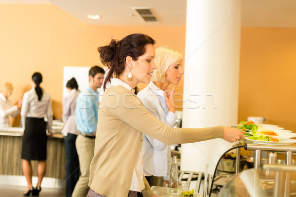 Fiatal üzlet kollégák kiválasztott étkezde ebéd Stock fotó © CandyboxPhoto