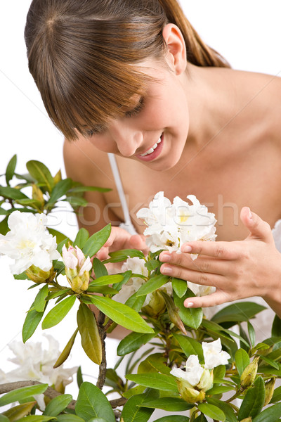 Stock photo: Gardening - Portrait of woman with Rhododendron