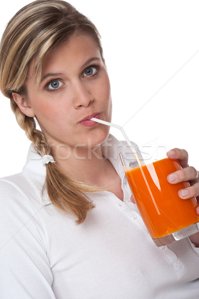 商業照片: woman drinking carrot juice on white background