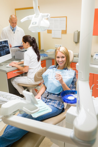 Feliz paciente mulher cirurgia dentária feminino dentista Foto stock © CandyboxPhoto