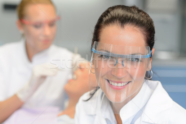 Professional dentist protective glasses patient checkup Stock photo © CandyboxPhoto