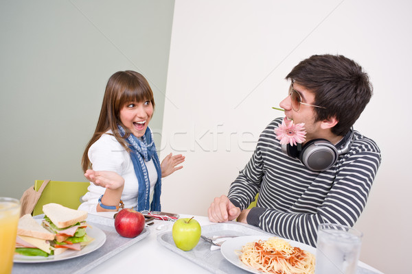 Student cafeteria - teenage couple having fun during lunch break Stock photo © CandyboxPhoto