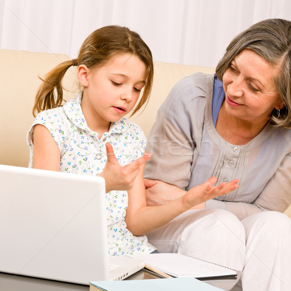 Grandmother and young girl with laptop learn count Stock photo © CandyboxPhoto