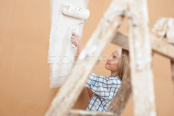 Amélioration de l'habitat femme peinture mur peinture [[stock_photo]] © CandyboxPhoto