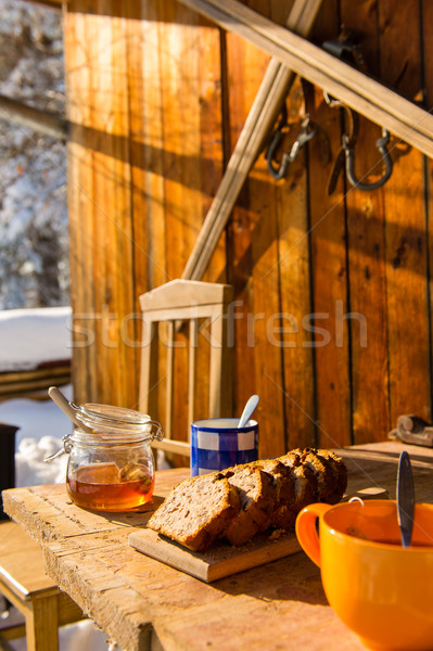 Snow winter cottage breakfast on wooden table Stock photo © CandyboxPhoto