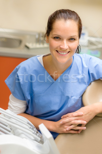 Smiling professional female dentist dental office Stock photo © CandyboxPhoto