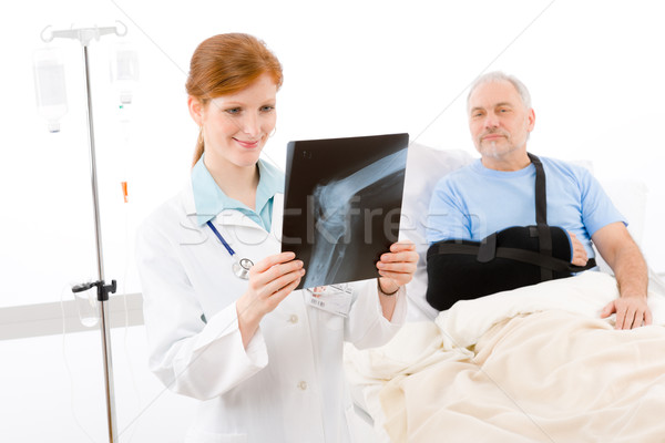 Hospital - female doctor examine patient x-ray Stock photo © CandyboxPhoto