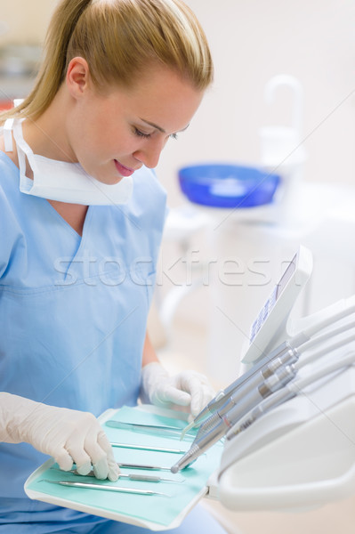 Stock photo: Dental nurse prepare medical tools