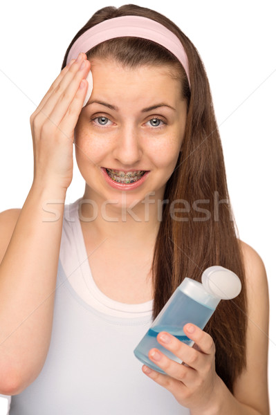 Girl with braces cleaning face isolated Stock photo © CandyboxPhoto