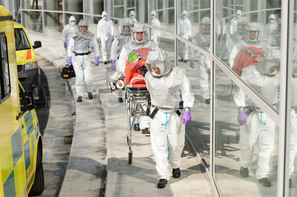 Biohazard medical team walking to building Stock photo © CandyboxPhoto