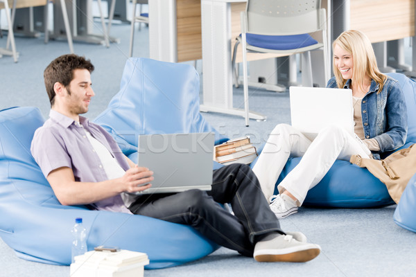 Young students at high-school pointing at laptop Stock photo © CandyboxPhoto