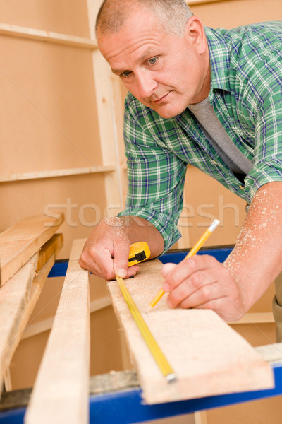 Handyman home improvement close-up of measure wood Stock photo © CandyboxPhoto