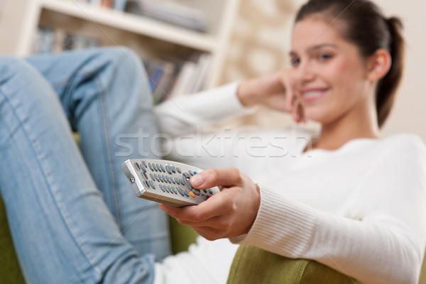 студентов улыбаясь женщины подростку Смотря телевизор гостиной Сток-фото © CandyboxPhoto