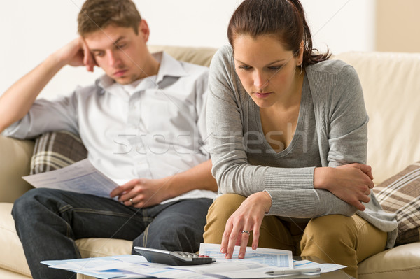 Irritado casal homem calculadora feminino Foto stock © CandyboxPhoto