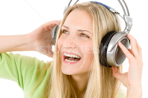 Foto stock: Alegre · mulher · fones · de · ouvido · ouvir · música · mulher · jovem